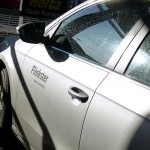 DetailFoto silbernes Carsharing Auto