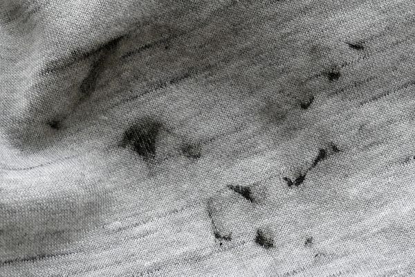 Fahrradschmiere auf Baumwollhose
